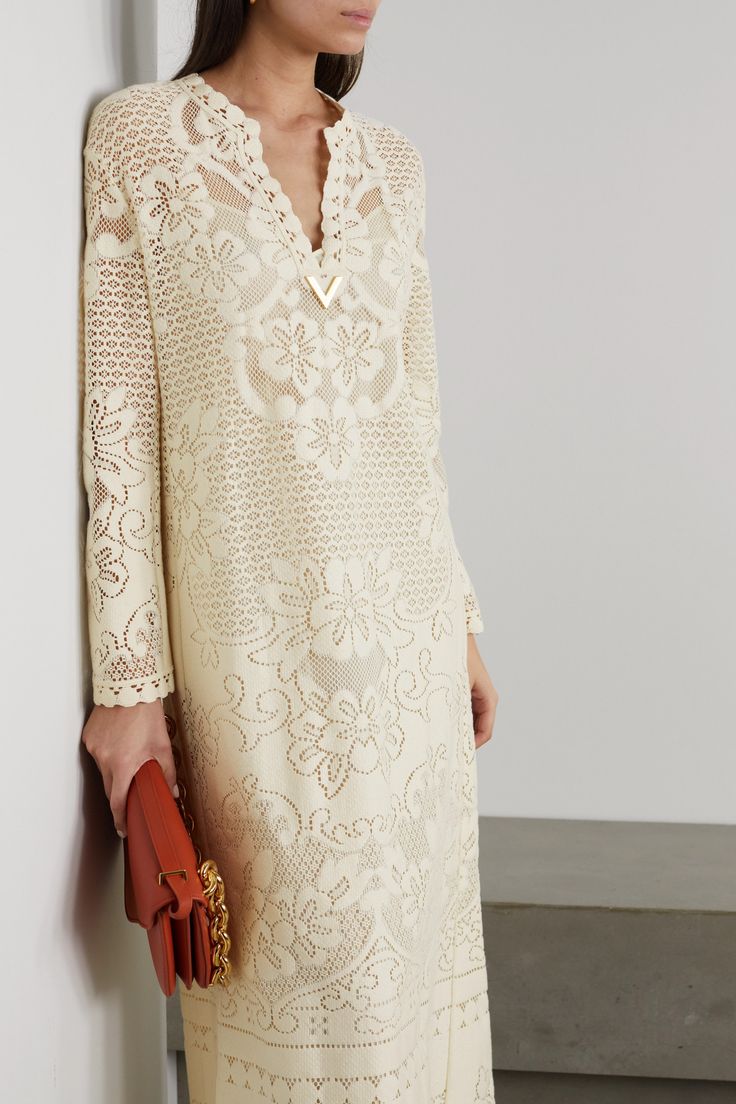 Find VALENTINO Embellished Crocheted Cotton-blend Maxi Dress on Editorialist. Valentino's cotton-blend maxi dress is delicately crocheted with flowers and scrolls. It's finished with the house's gold-toned 'V' at the neckline and breezy enough to wear on warm summer days. Team yours with sandals and a basket bag. Italian House, Valentino Clothing, Elegant Dresses Classy, Maxi Dress Cotton, Lace Midi, Basket Bag, Lace Midi Dress, Cream Dress, Lace Mini Dress