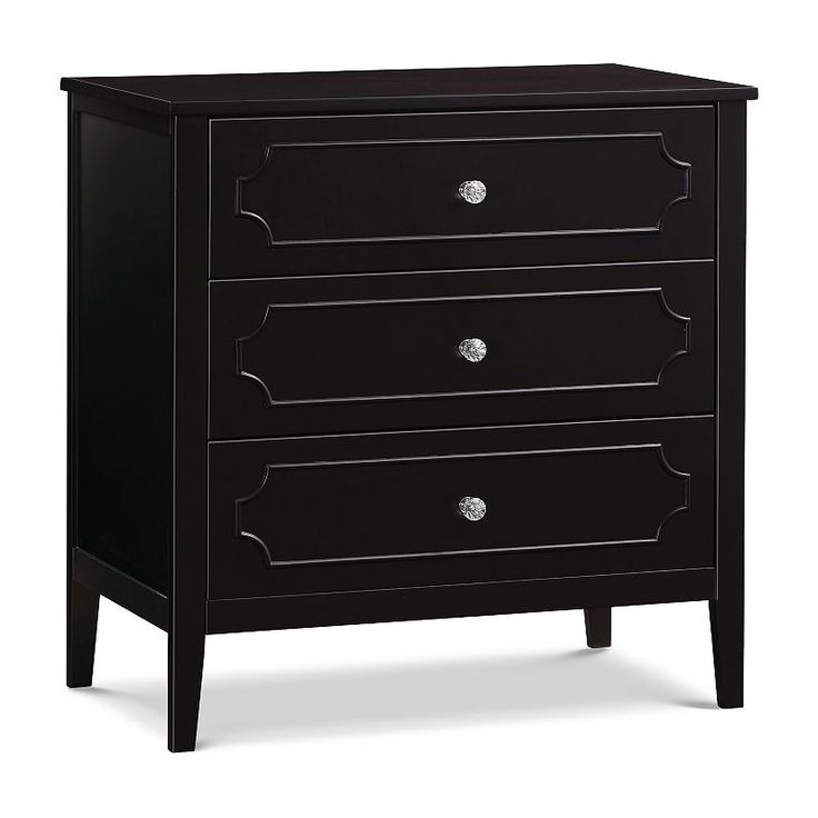 a black chest of drawers with three drawers