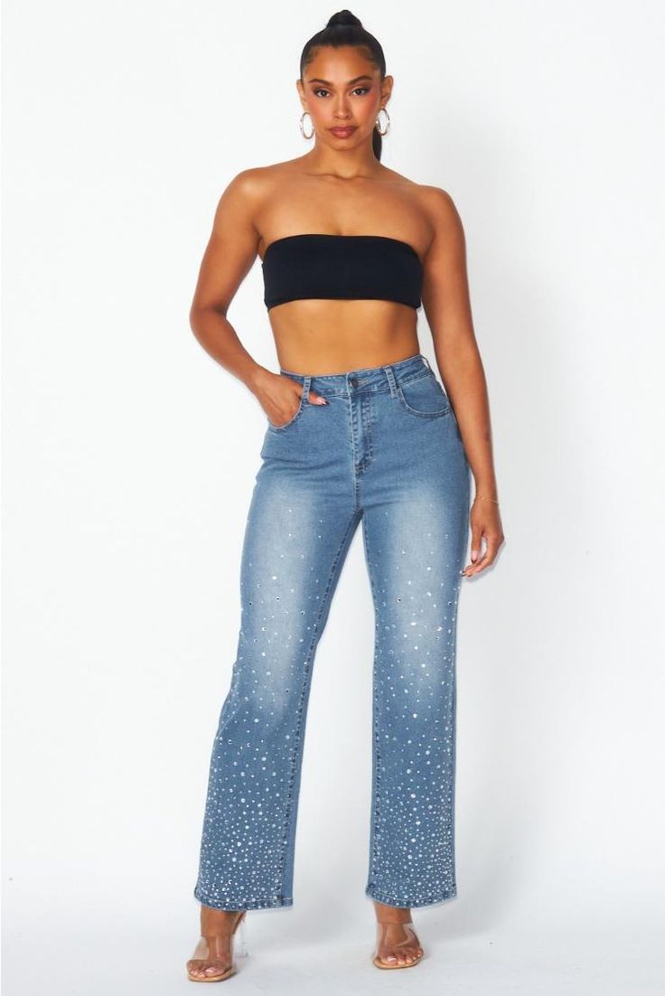 Get ready to elevate your denim game with our High Rise Rhinestone Denim Jean Pants! These pants feature a high rise silhouette and glamorous rhinestone detailing for a touch of sparkle. Perfect for adding some fun to your everyday look, these jeans are sure to become your new fashion go-to. (Just remember to accessorize with some sass!) Light wash denim High waisted Zipper/button closure Rhinestone detail Straight leg Rhinestone Denim, Rhinestone Jeans, Blue Jean Outfits, Jean Pants, Light Wash Denim, New Tops, Denim Pant, Birthday Dresses, Denim Jean