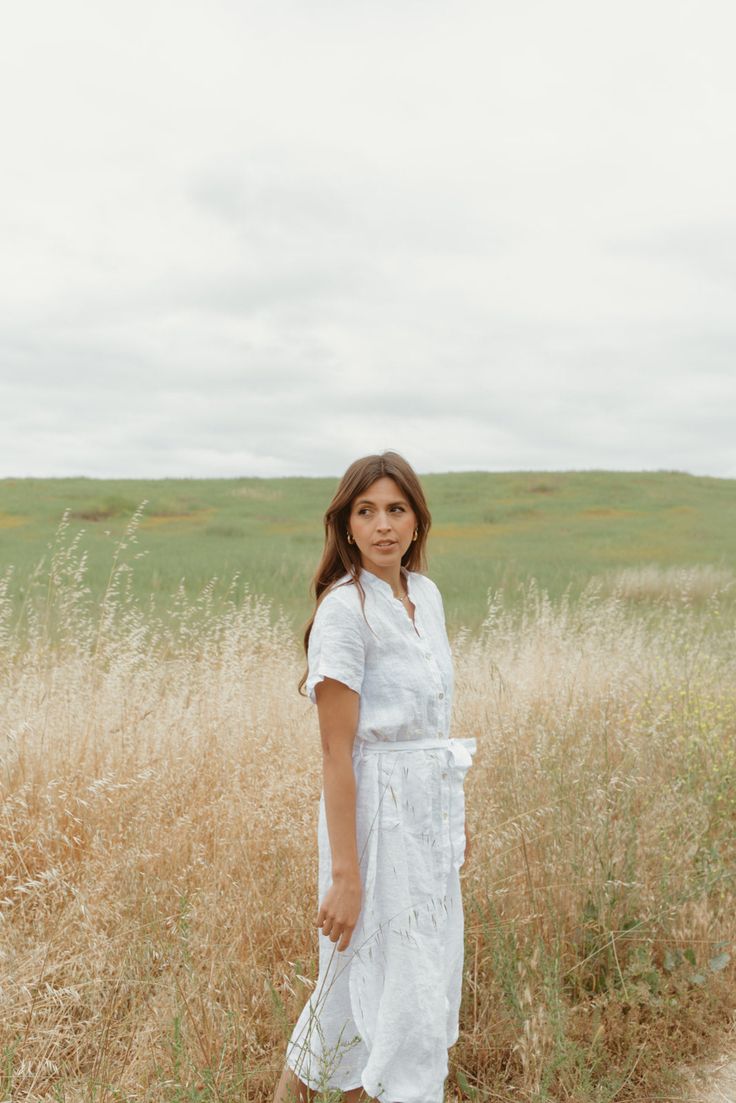 Beautiful Structured dress in a french linen fabric. Lined with shell buttons. Features front pockets and side slits on both legs. Such an easy breezy throw on and go piece for summer. Sizing Details: One size. Fits most comfortably between US sizes 2-10 Care Instructions: Gentle wash on cold and hang to dry. A steam is the best way to get wrinkles out of your linen. Knee-length Linen Shirt Dress For Day Out, Summer Linen Midi Dress For Daywear, Breezy Linen Dress For Day Out, Breezy Linen Midi Dress For Daywear, Casual Linen Day Dresses, Casual Linen Dresses For Daywear, Short Sleeve Linen Midi Dress For Day Out, Summer Linen Button Dress, Summer Linen Dress With Buttons