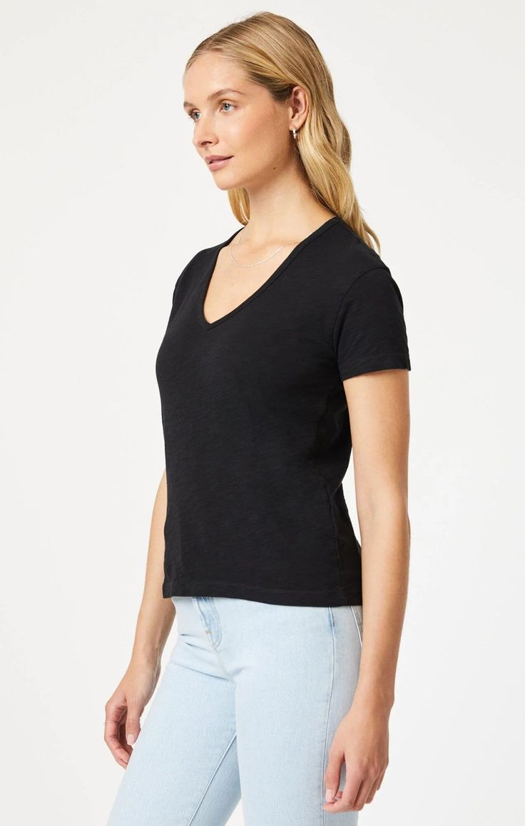 No closet is complete without a basic tee. This ultra-luxe v-neck t-shirt is perfect for a stylish yet comfortable look. Its semi-fitted design ensures a flattering look that serves as the perfect base layer or stand-alone piece. Item Details: Short Sleeve V-Neckline Semi-Slim Fit Lightweight Fabric Content: 100% Cotton Fit Details: We find that the Gloria Top runs true to size. Made under fair working conditions in Turkey. Mavi is a company built on quality, innovation, passion, and respect for No Closet, Fit Details, Jumpsuit Shorts Rompers, Running Tops, Romper Dress, Short Jumpsuit, Dress With Cardigan, Basic Tee, Jersey Tee