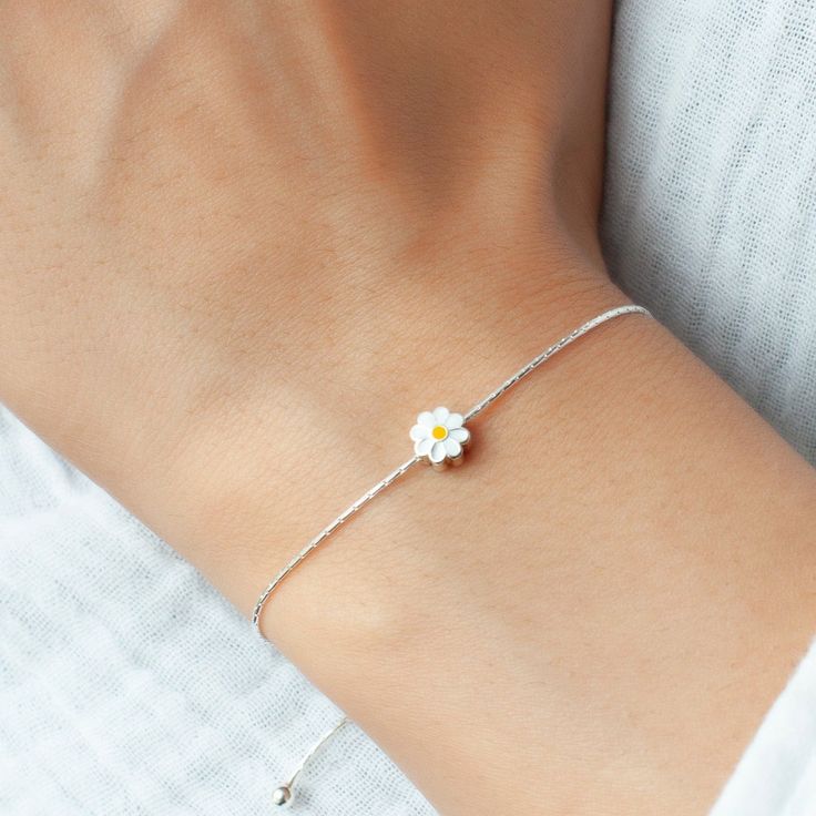 Whether you're looking to treat yourself or searching for the perfect gift, our Daisy Jewelry eloquently embodies the timeless allure of nature's beauty. Crafted with high-quality materials to ensure durability and longevity. ♥ 925 Sterling Silver ♥ Bracelet diameter 9 inches ♥ Necklace chain is 16 inches long ♥ Sizing: Adjustable ♥ Makes a great gift for birthdays, Valentine's day, anniversaries or any other special occasions. Your bracelet arrives beautifully packaged. Perfect for gift-giving, Delicate White Adjustable Jewelry, White Dainty Bracelet Jewelry, Dainty White Bracelet Jewelry, White Minimalist Bracelet Jewelry, Minimalist White Bracelet Jewelry, Dainty White Resizable Jewelry, Resizable Silver Jewelry For Everyday, White Resizable Bracelet Jewelry, Delicate Adjustable Hypoallergenic Bracelets