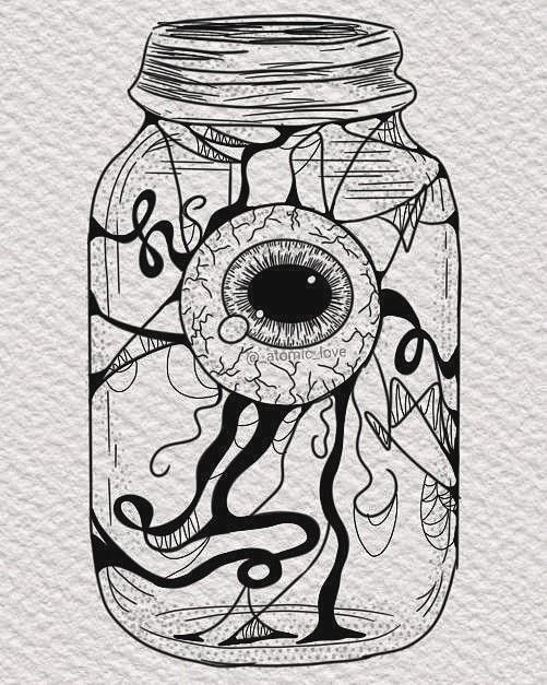 a mason jar with an eye inside