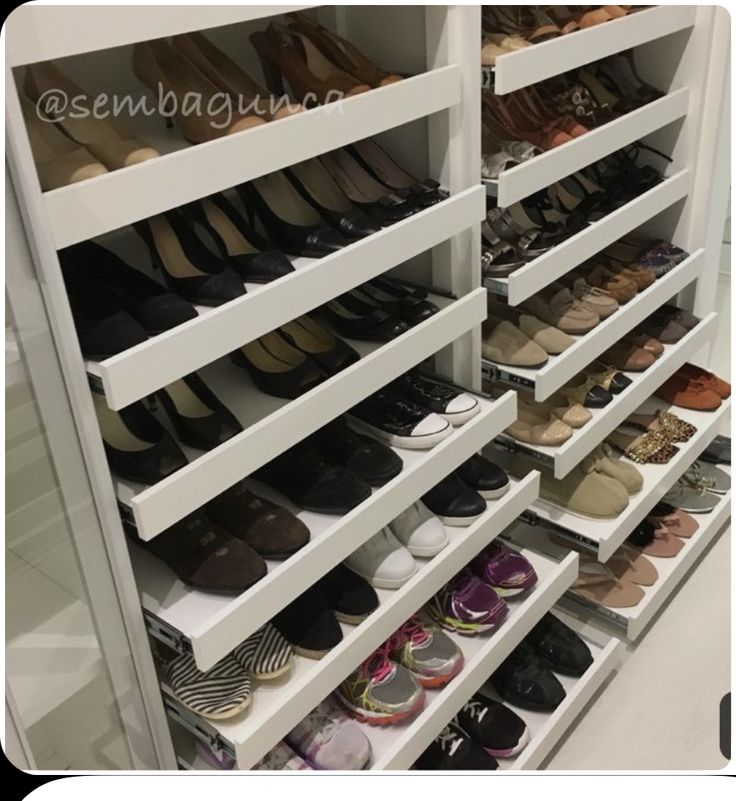 the shoe rack is full of shoes for all kinds of people to choose between them