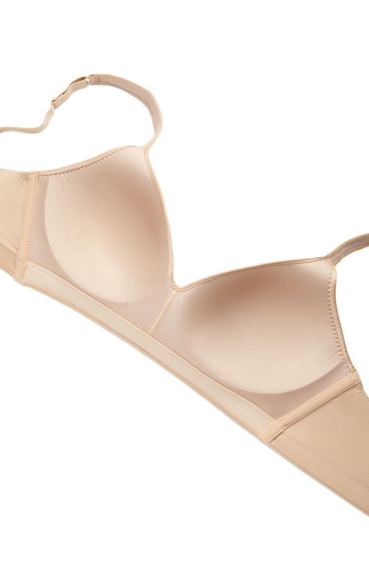 This wireless bra with supremely soft fabric and a continuous foam frame moves with you throughout your day. Supportive stretch pads offer a gentle lift and naturally enhance your shape, while wide elastic at the underbust and side-seam boning provides a secure hold. 81% nylon, 19% elastane Hand wash, line dry Imported Elegant Full Coverage Seamless Sports Bra, Supportive Light Support Push-up Bra, Light Support No-show Bra, Stretch Nursing Bra With Removable Pads And Full Coverage, Stretch Nursing Bra With Removable Pads, Compressive No-show Bra With Removable Pads, Shaping Bra With Medium Bust Support And No-show Design, Elegant Full Coverage Nursing Bra With Light Support, Supportive Underwire Bra In Beige