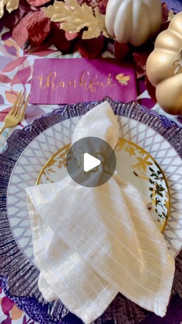 an image of a table setting with napkins and place settings for the dinner party