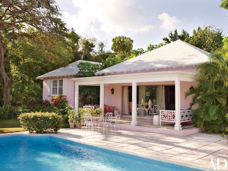 a house with a swimming pool and patio