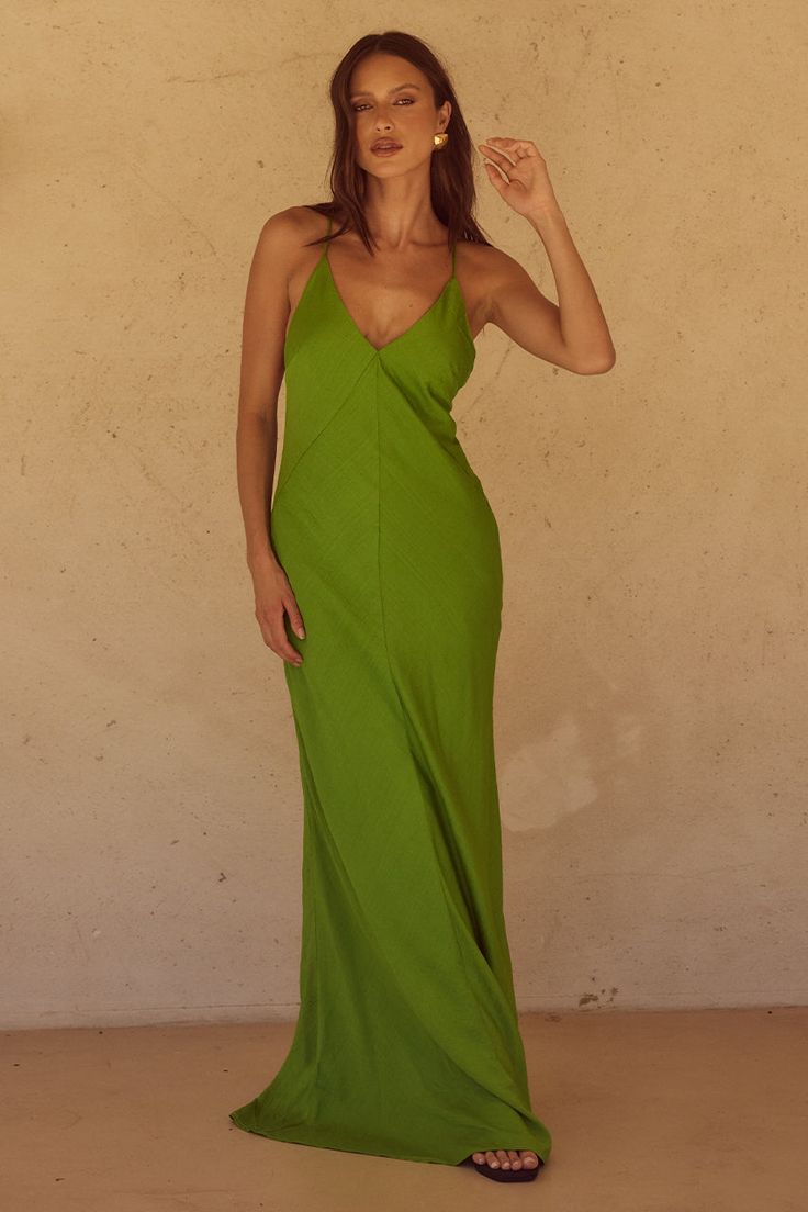 Featuring a low neckline and plunging at the sides, our Aidana Maxi Dress is the perfect relaxed, sexy look.  - Maxi length- Deep V neckline- Open back detail - Side seam invisible zipper- Side pockets- Lined without stretch- Body: 100% Polyester, Lining: 95% Polyester & 5% Spandex Please refer to care label for ga Luxury Summer Maxi Dress With Gathered Neckline, Luxury Rayon V-neck Maxi Dress, Luxury A-line Maxi Dress For Summer, Affordable Cotton V-neck Maxi Dress, Luxury V-neck Maxi Dress With Buttons, Luxury V-neck Maxi Dress Casual Style, Luxury V-neck Casual Maxi Dress, Luxury Green V-neck Maxi Dress, Luxury Casual V-neck Maxi Dress