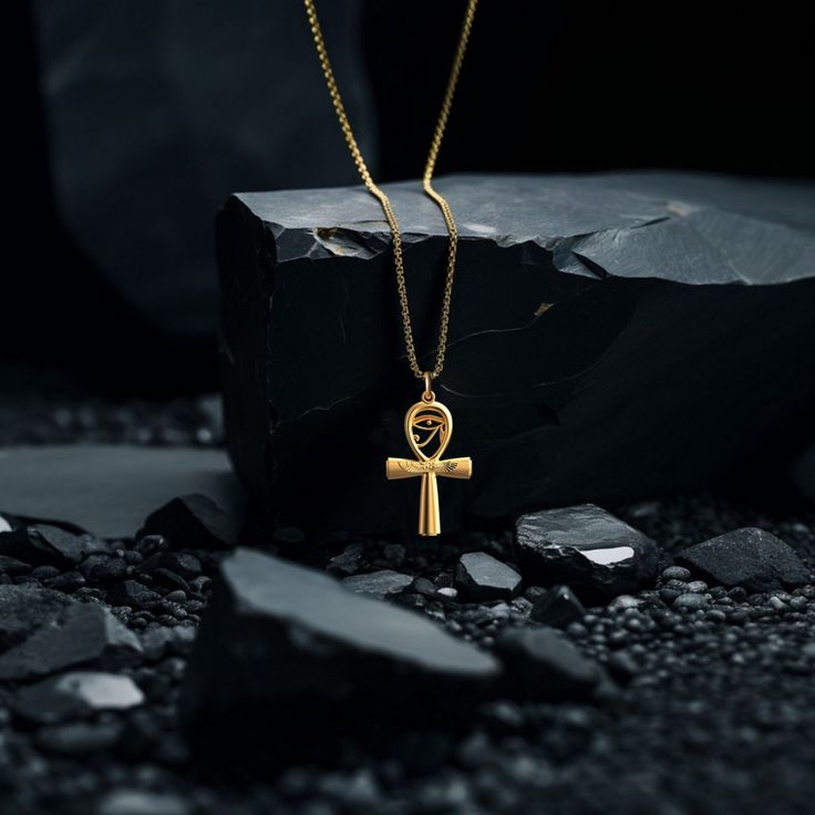 This solid gold key of Ankh necklace showcases exquisite craftsmanship, symbolizing life and spirituality. The key of Ankh pendant is more than just jewelry; it's a fine representation of ancient Egyptian elegance and the timeless allure of this sacred symbol. PENDANT INFORMATIONThis pendant is made of real, solid gold.• Made in USA• Material: 14k or 18k solid gold• Finish: polished• Height: 1.5" (38 mm) | *includes the small circle, bail dimensions not included• Width: 0.87" (22 mm)• Pendant we Yellow Gold Ankh Necklace, Luxury Gold Ankh Jewelry, Spiritual Ankh Necklace In Yellow Gold, Gold Ankh Amulet Jewelry, Symbolic Engraved Ankh Jewelry, Spiritual Ankh Necklace Hallmarked, Ankh Pendant, February Crafts, Ankh Necklace