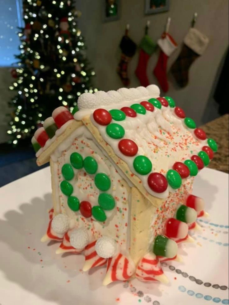 a gingerbread house decorated with candy and candies