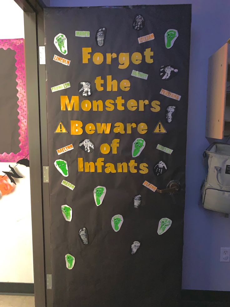 a door with magnets on it that says forget the monsters beware of infants