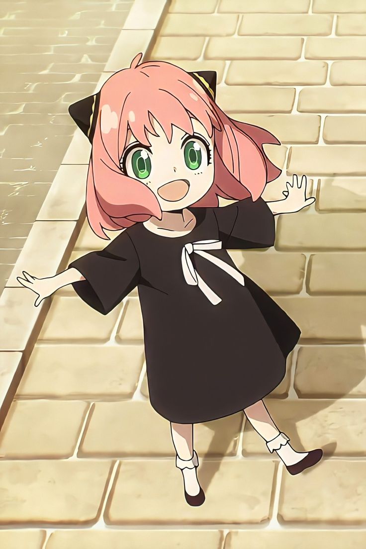 an anime character with pink hair and green eyes is walking down the street in front of a brick wall