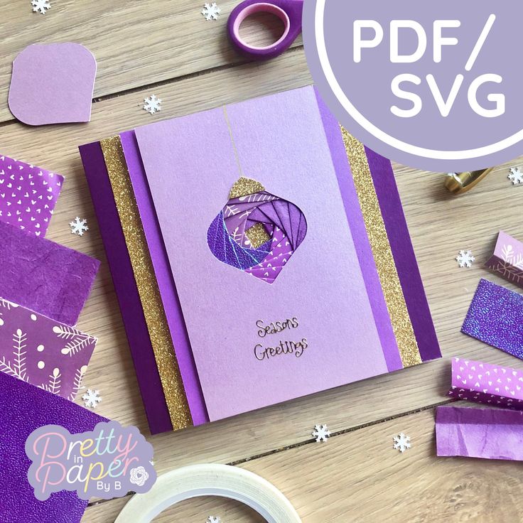 purple and gold greeting card surrounded by crafting supplies on a wooden table with the words pretty paper studio