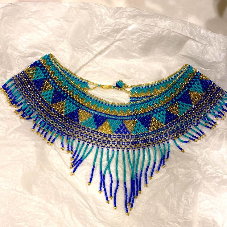 Very Unique And Conversational Choker Necklace. Never Worn. Reminds Me Of A Peacock! Would Love Someone To Have This Piece!! Very Bohemian, Festival Look! Bohemian Blue Jewelry With Gold Beads, Festival Blue Beaded Necklaces With Colorful Beads, Blue Bohemian Necklaces For Party, Bohemian Large Blue Beads, Handmade Blue Beaded Necklaces For Festivals, Traditional Blue Beaded Necklaces, Traditional Blue Jewelry For Beach, Traditional Blue Beach Jewelry, Blue Beaded Necklaces For Festivals