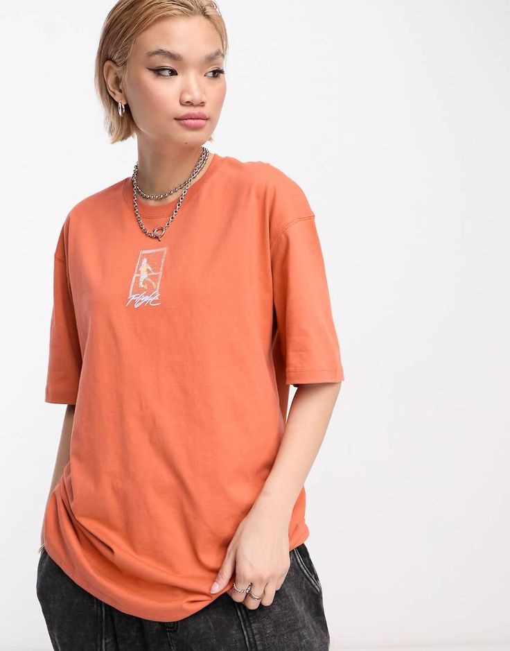 Top by Nike Your new go-to Crew neck Drop shoulders Print to chest and back Oversized fit Oversized Cotton Nike Tops, Oversized Nike Cotton Top, Nike Cotton Oversized Tops, Oversized Orange Casual Tops, Oversized Trendy Orange Tops, Oversized Orange Tops For Streetwear, Trendy Oversized Orange Top, Orange Relaxed Fit Tops For Streetwear, Nike Oversized Short Sleeve Tops