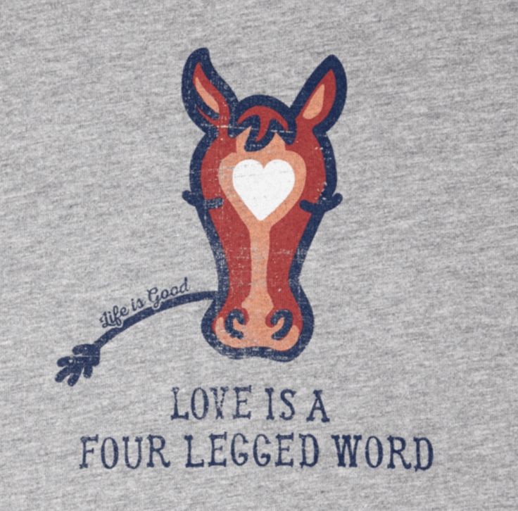 a t - shirt that says love is a four legged word with a horse on it