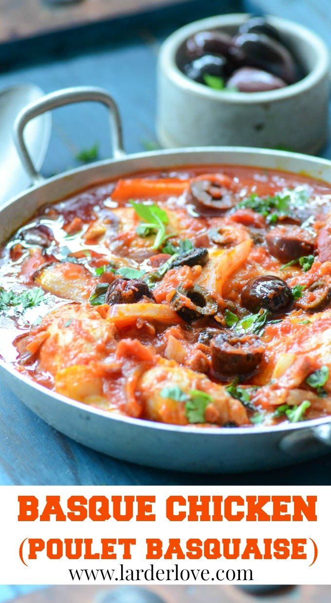 a close up of a pan of food on a table with the words basque chicken poulet baquile