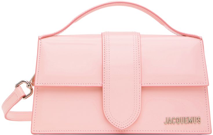 Patent leather top handle bag in pink. · Fixed carry handle · Detachable and adjustable shoulder strap · Logo hardware at face · Patch pocket at back face · Foldover flap · Patch pocket at interior · Twill lining · Logo-engraved silver-tone hardware · H5 x W9.25 x D2.75 in Part of the Le Chouchou collection. Supplier color: Pale pink Face Patches, Silver Engraving, Handle Bag, Leather Top, Pale Pink, Patch Pocket, Top Handle, Patent Leather, Top Handle Bag