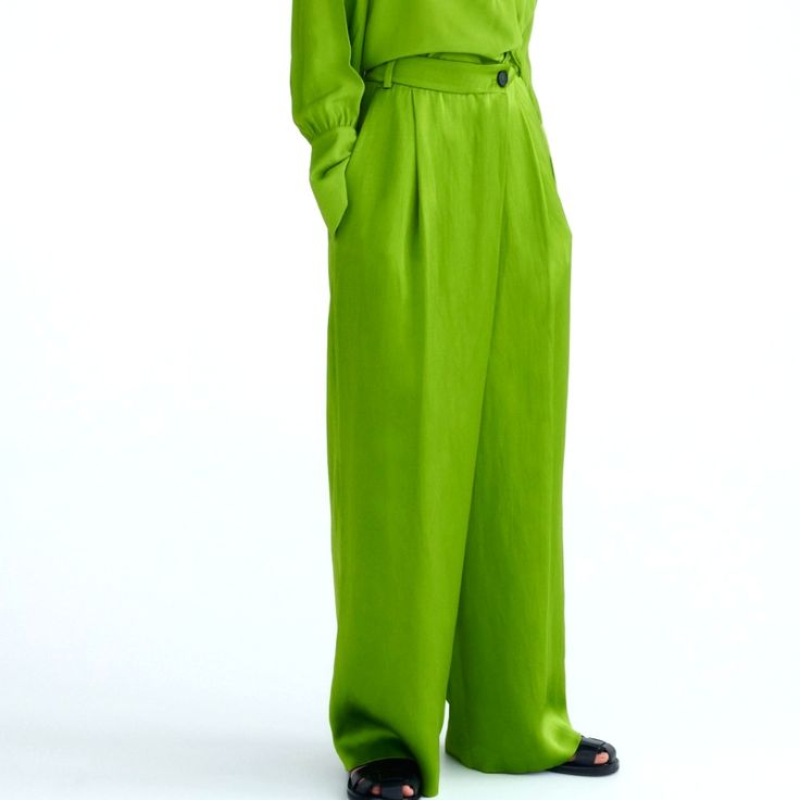 Blogger Favorite Sold-Out Statement Piece Wide Leg Flowy Pants With Pockets High Waisted Elegant Zara Wide Leg Pants With Pockets, Zara Elegant Wide Leg Pants With Pockets, Zara Wide Leg Elegant Pants, Elegant Wide Leg Zara Pants, Elegant Green Bottoms With Pockets, Elegant Green Wide Leg Pants With Pockets, Elegant Zara Pants In Solid Color, Elegant Zara Pants, Elegant Zara Pants With Elastic Waistband