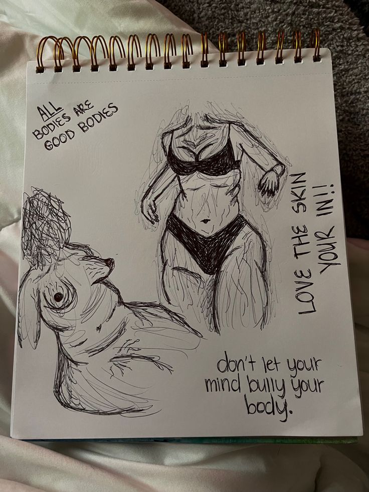 a notepad with some drawings on it that says, i don't let your mind build your body