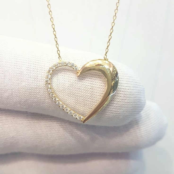 - Forever Love Heart Pendant Necklace is made with high quality 14K real solid gold. - High polish finish and half of the heart necklace for women decoreted with white diamond cut zirconia stones . - This cute, charm, dainty, delicate, elegant and trendy women jewelry Heart pendant necklace has been artfully designed for timeless yet modern millennial fashion. - You receive the necklace in a beautiful and free gift box - Free shipping (Arrive within 4 business days to the USA and Canada ( 1 day White Diamond Cut Heart Pendant Necklace, White 14k Gold Heart Cut Necklace, 14k Gold White Heart Necklace For Valentine's Day, White 14k Gold Heart Necklace For Valentine's Day, White Heart Cut Necklace For Her, Valentine's Day White Heart Necklace In 14k Gold, White Diamond Cut Open Heart Necklace, Valentine's Day 14k Gold White Heart Necklace, White Open Heart Diamond Cut Necklace