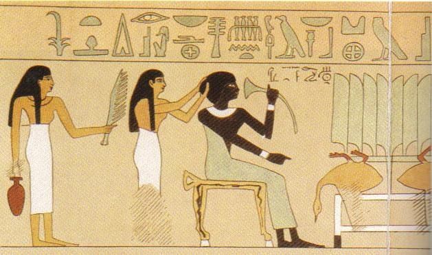 an egyptian scene with two women and one man in the process of painting on a wall