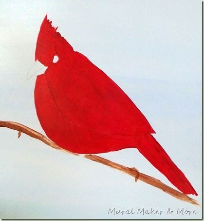 a red bird sitting on top of a wooden branch in front of a white sky