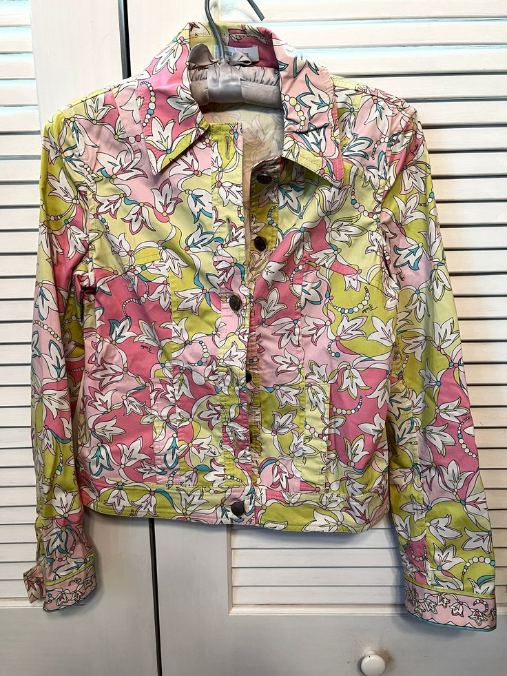 Size 4/36. This is most likely from the early 2000's and the pallet is more pastel than his usual brights. Button front with all Pucci buttons present on the front and at the cuff. Charming and in great condition. 19 inches long and 22 inch sleeves. Bottom band and bordered cuffs. Body is 28 inches and the sleeves measure 10 inches. The textile is a medium cotton fabric.  International shipping must be quoted. Please check my shop again for all things Pucci as I list new items weekly. All vintage items listed are in as is condition and could show some minor wear. I have tried to give accurate descriptions of the condition of each in my opinion. But most have been used at some point. They are not new, some have the original hang tags but they are still 20-50 years old and have been in stora Designer Pink Outerwear With Button Closure, Multicolor Spring Outerwear With Button Closure, Spring Multicolor Outerwear With Button Closure, Designer Spring Outerwear With Button Cuffs, Designer Spring Outerwear With Covered Buttons, Designer Pink Spring Outerwear, Emilio Pucci, Vintage Chanel, Hang Tags