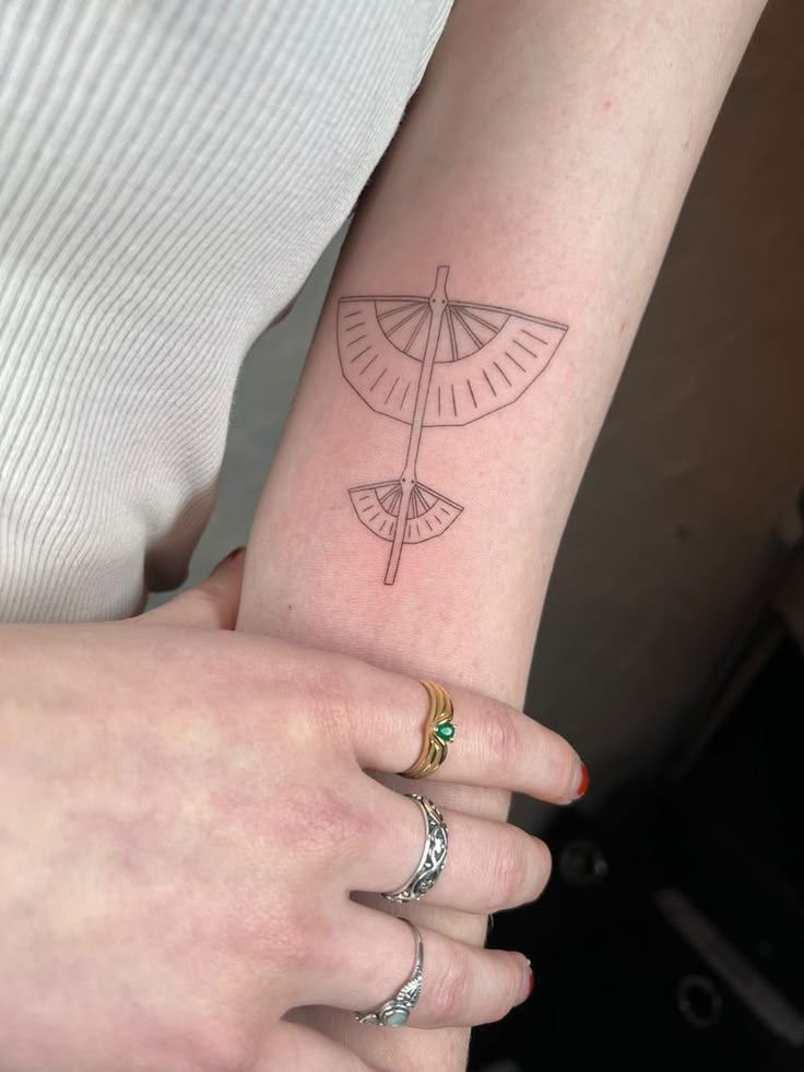 #avatar #avatartattoo #glider #glidertattoo #aangsglider #zuko #aang #katara #toph Aang Staff Tattoo, Aang's Staff Tattoo, Aang's Glider Tattoo, Aang Arrow Tattoo, Avatar Glider Tattoo, Aang Glider Tattoo, Subtle Avatar The Last Airbender Tattoo, Waterbender Tattoo, Iroh Avatar Tattoo