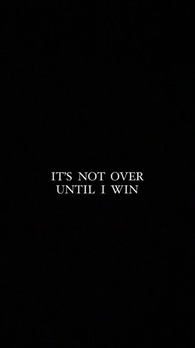 the words it's not over until i win are written in white on a black background