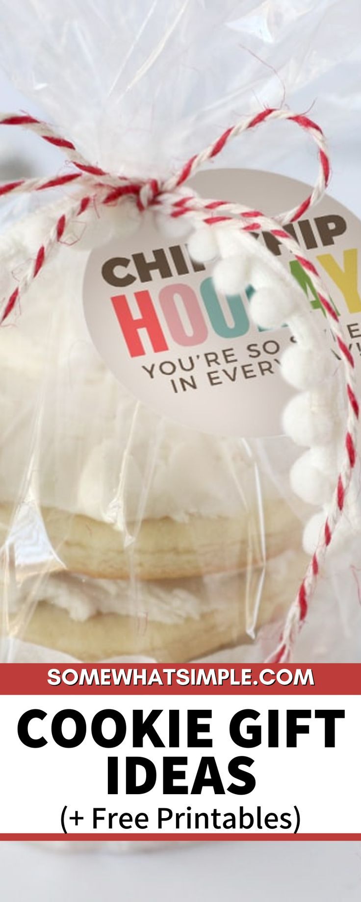 a bag filled with cookies sitting on top of a white table next to a red and white ribbon