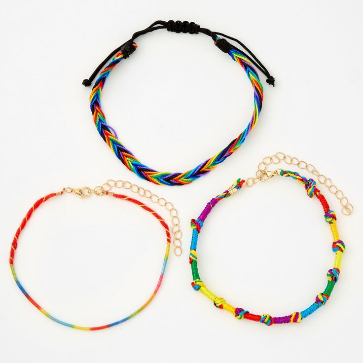 Keep your ankles bright and colorful this summer! This pack includes three different designs of rainbow cord anklets. Length: 9" + 2" extender Finish: Gold-tone Closure: Bolo/Lobster clasp Pack Size: 3 Material: Polyester - Claire's Rainbow Cord Anklets - 3 Pack Trendy Multicolor Anklets For Spring, Multicolor Adjustable Nylon Cord Friendship Bracelets, Adjustable Multicolor Nylon Cord Friendship Bracelets, Multicolor Braided Bracelets With Adjustable Length, Multicolor Nylon Cord Friendship Bracelets For Festivals, Adjustable Multicolor Anklets For Spring, Spring Adjustable Multicolor Anklets, Casual Multicolor Braided Bracelets With Adjustable Length, Spring Multicolor Adjustable Anklets