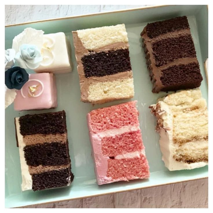 four different types of cake on a plate