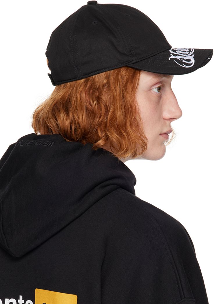 Cotton twill cap in black. · Logo embroidered at face · Graphic embroidered at curved brim · Eyelets at crown · Logo-embroidered velcro fastening Supplier color: Black Black Hat With Embroidered Logo And Curved Visor, Black Hats With Embroidered Logo For Streetwear, Black Baseball Cap With Embroidered Logo For Streetwear, Black Curved Brim Baseball Cap With Embroidered Logo, Urban Black Dad Hat With Embroidered Logo, Flat Cap Fitted Hat With Embroidered Logo For Streetwear, Embroidered Logo Fitted Hat For Streetwear, Fitted Flat Cap With Embroidered Logo For Streetwear, Black Streetwear Baseball Cap