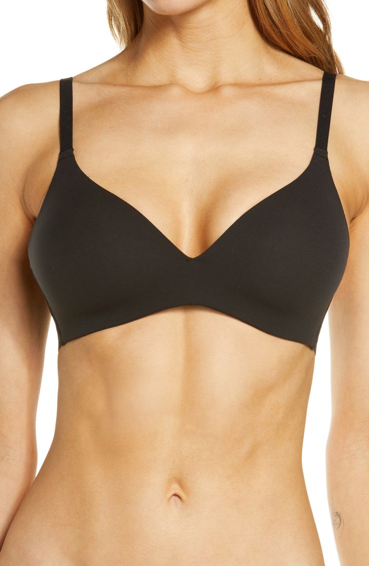 This seamless, wireless T-shirt bra disappears under clothing and features memory foam cups for a comfortable, contoured fit. Partially lined 55% nylon, 45% spandex Hand wash, dry flat Imported Seamless Medium Support Nursing Bra, Modern Fitted Seamless Sports Bra, Black Seamless No-show Sports Bra, Black No-show Sports Bra With Built-in Bra, Black Nursing Bra With Medium Bust Support, Fitted Black Nursing Bra With Seamless Construction, Black No-show Soft Touch Bra, Black No-show Soft-touch Bra, Modern Fitted Seamless Bra