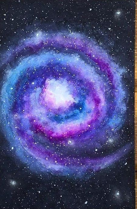 a painting of a spiral galaxy with stars in the background on a wooden table top