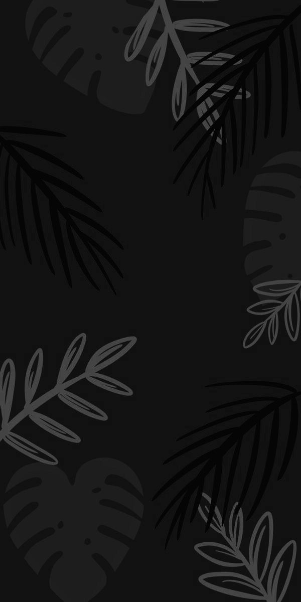 black and white leaves on a dark background