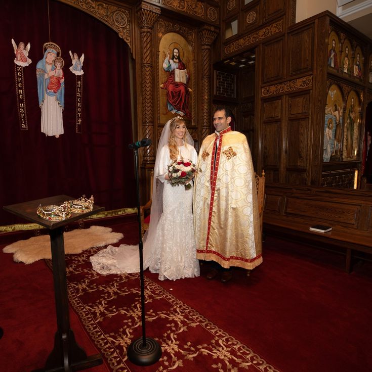 a bride and groom standing next to each other in front of the alter at a church