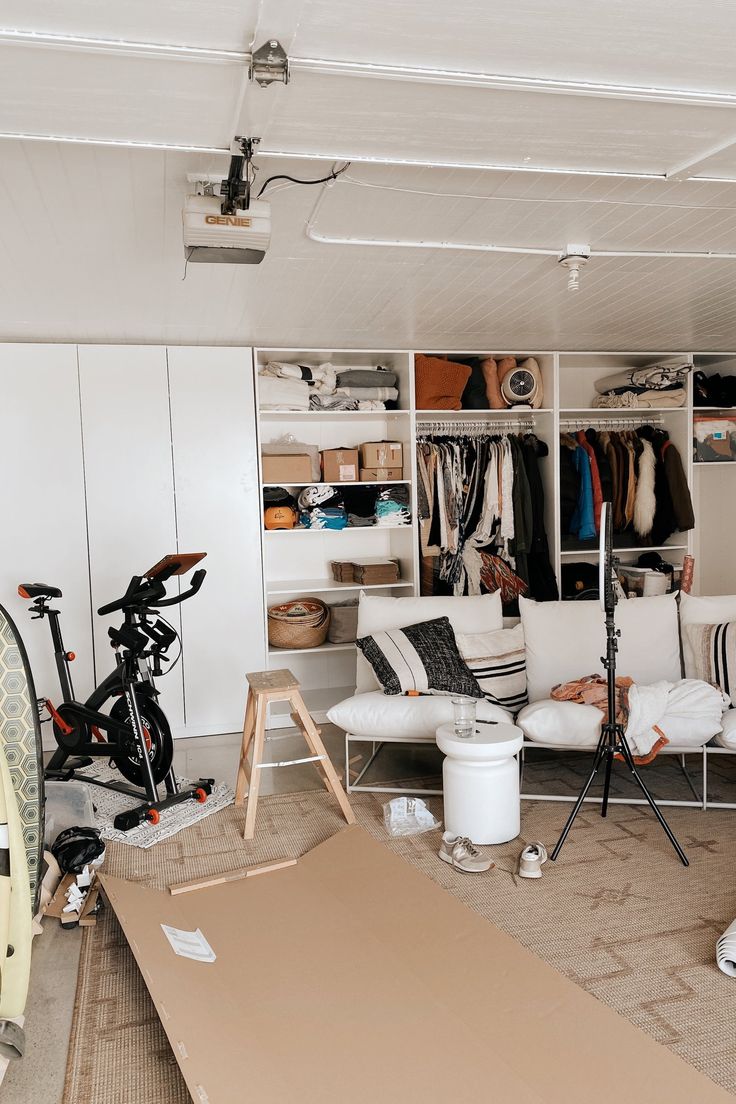 a living room filled with furniture and lots of clutter