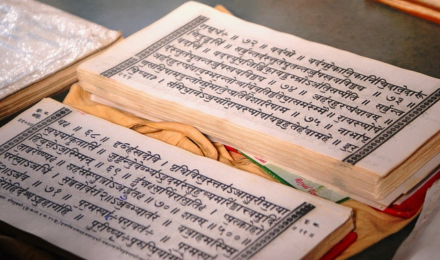 an open book sitting on top of a table