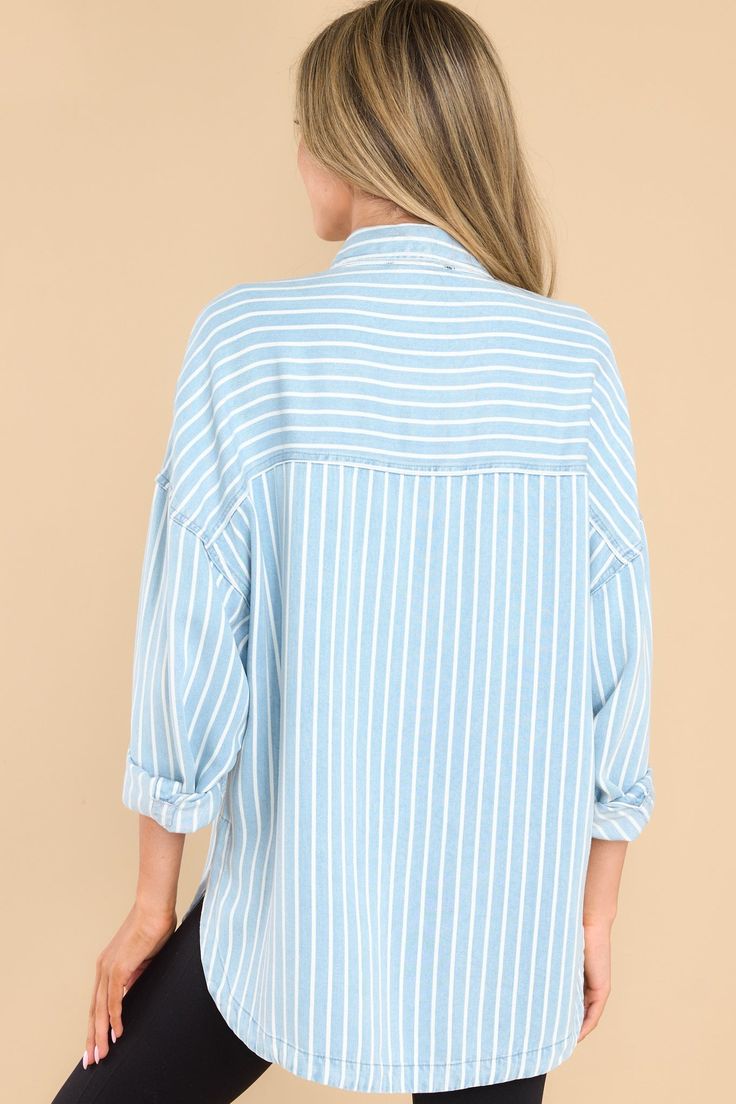 Looking for an effortless classic? This Always Lovely Blue Striped Top is your go-to for effortless, casual style. Throw it on and get ready for the compliments! This top features a collared neckline, functional buttons down the front, two functional bust pockets, long sleeves with buttoned cuffs, a scoop bottom hem, and a super soft material. Model is wearing a small. • 100% Lyocell • Hand Wash Cold • Unlined • Imported Trendy Blue Top With Collared Neckline, Oversized Light Blue Collared Top, Oversized Collared Light Blue Top, Casual Blue Top With Collared Neckline, Casual Blue Tops With Collared Neckline, Oversized Light Blue Button-up Top, Light Wash Collared Tops For Day Out, Light Wash Collared Top With Button Closure, Light Wash Oversized Collared Top