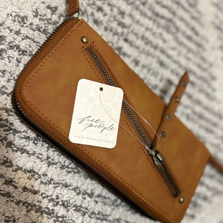 Free People Wallet, Never Used Originally $58 Trendy Brown Wallet With Cell Phone Pocket, Trendy Wallets With Interior Card Slots, Trendy Clutch Wallet For Everyday Use, Trendy Everyday Crossbody Wallets, Trendy Everyday Clutch Wallet, Trendy Rectangular Wallet For Everyday Use, Trendy Everyday Clutch With Interior Card Slots, Everyday Brown Clutch With Interior Card Slots, Trendy Brown Wallets For Everyday Use