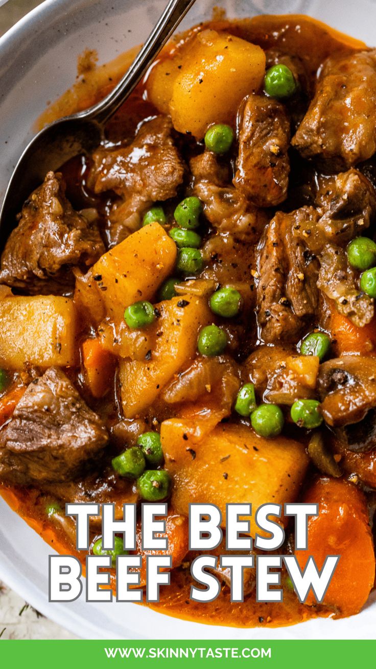 the best beef stew with peas and carrots in a white bowl on top of a table