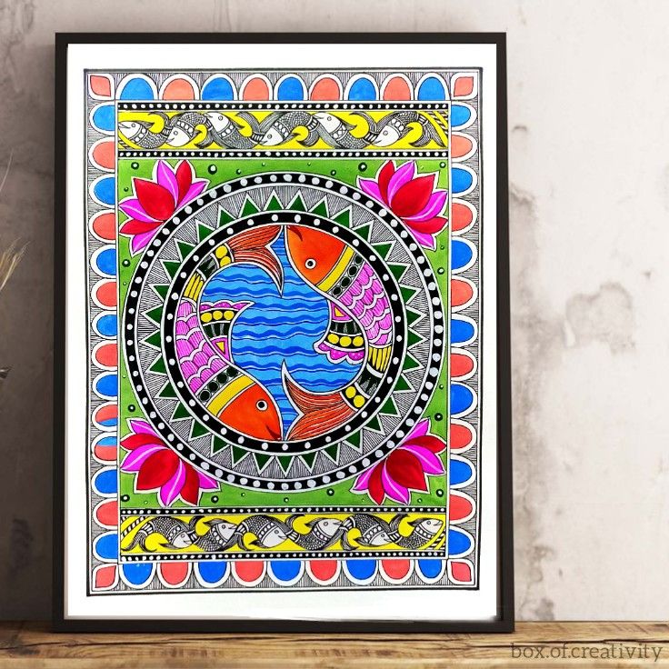 a colorful fish art print hanging on a wall