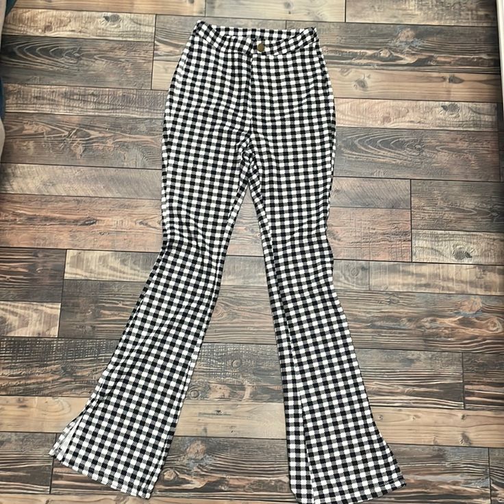 Gingham Flares Pants. Size Xs Never Worn. Stretchy Material. Super Flattering! Trendy Wide Leg Gingham Pants, Casual Plaid Pants For Picnic, Trendy Gingham Bottoms For Picnic, High Waist Plaid Bottoms For Picnic, Casual High Waist Gingham Pants, Trendy Cotton Bottoms For Picnic, Fall Gingham Trousers, Trendy Gingham Bottoms, Trendy Gingham Fitted Bottoms