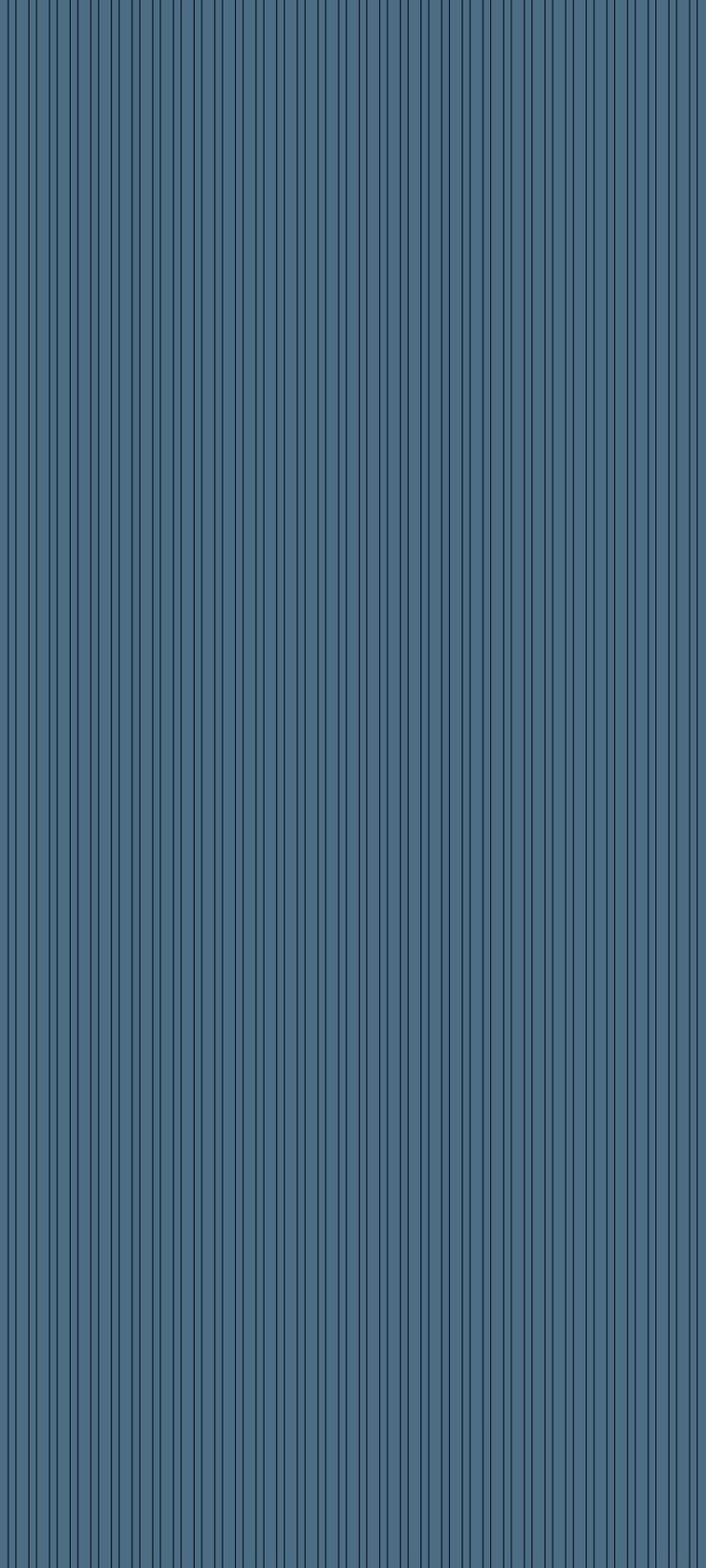 a blue striped wallpaper with vertical lines