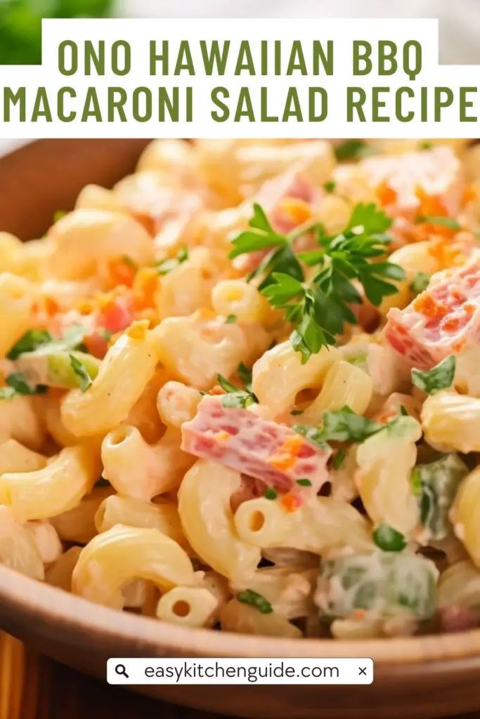 a bowl filled with macaroni salad on top of a wooden table