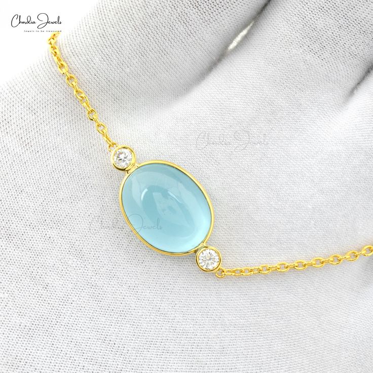 Description Natural Aquamarine Oval Cabochon Chain Bracelet with Diamond Accent 14k Solid Yellow Gold Bracelet For Her, Diamond Jewelry, Handmade Jewelry, 14k Gold Jewelry, Gemstone Bracelet, gemstone Jewelry For Her, Oval Cabochon Jewelry, March Birthstone For Gift Product Details SKU CJ-B-1687-AQ-YG-NW Metal 14k Solid Yellow Gold Chain Type Cable Chain Closing Mechanism Spring Ring Product Dimension 7 Inches Certification - Stone Details Stone name Aquamarine Stone size 16.7 x 13mm Stone piece Gold Aquamarine Jewelry With Bezel Setting, Elegant Gold Aquamarine Bracelet, Diamond Chain Bracelet, Bracelet For Her, March Birthstone, Bracelet Gemstone, Cabochon Jewelry, Diamond Chain, Aquamarine Stone