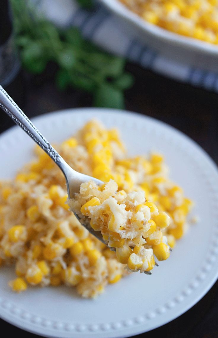 a white plate topped with macaroni and cheese