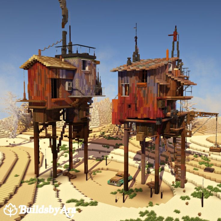 two wooden houses sitting in the middle of a desert area with trees on each side